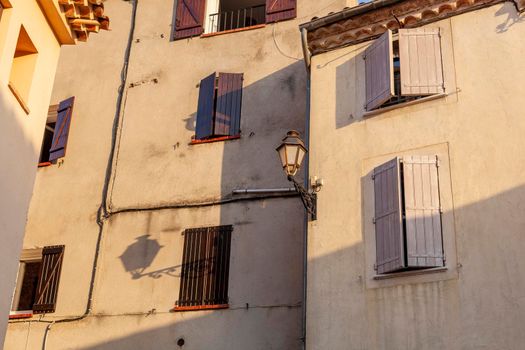 old european village building with the light shadows on it