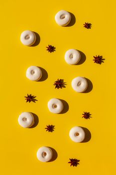 french and spanish speciality rousquilles anise flavor desserts on the yellow background, pattern, hard light, top view