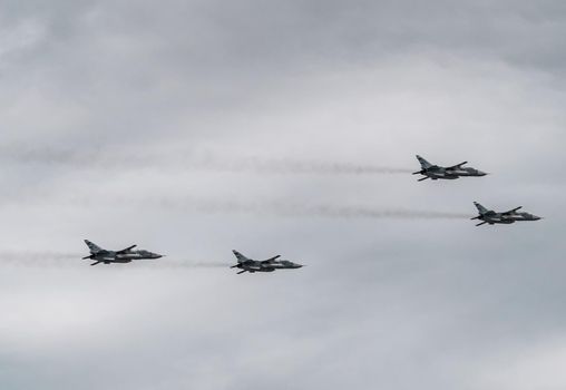 Russia, St. Petersburg, 28 July 2022: Military aircraft and helicopters of the air force fly on the city at the celebration of the Day of the Navy, amphibious and transport aircraft, anti-submarine. High quality photo