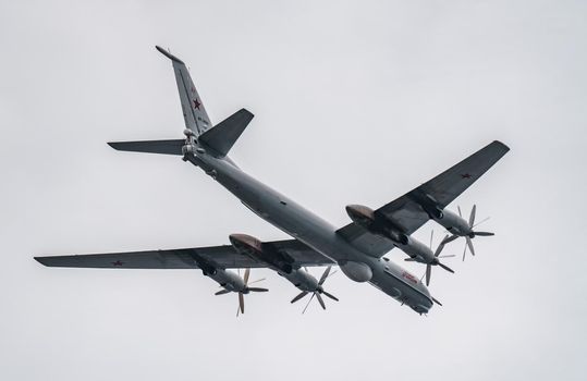 Russia, St. Petersburg, 28 July 2022: Military aircraft and helicopters of the air force fly on the city at the celebration of the Day of the Navy, amphibious and transport aircraft, anti-submarine. High quality photo