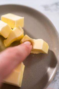 Softened sticks of unsalted butter on in the microwave.