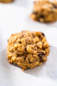 Freshly baked soft oatmeal raisin walnut cookies.