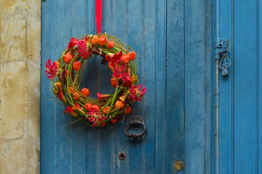 Wreath of autumn plants with physalis and orchids