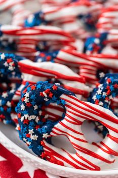 American flag. Red, white, and blue chocolate-covered pretzel twists.