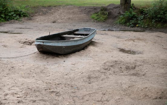 a old boat on the bottom of the river because the waterlevel is to low