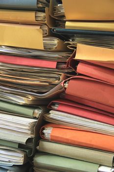 Stacked office files: pile of files in an office