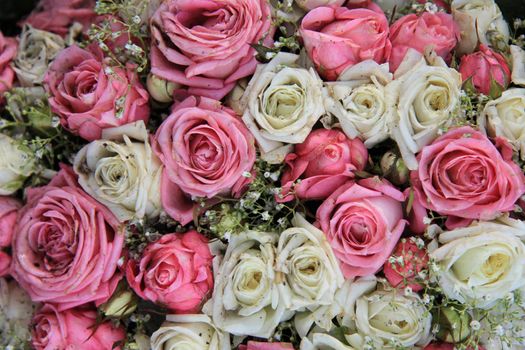 Mixed wedding flower arrangement: various flowers in different pastel colors