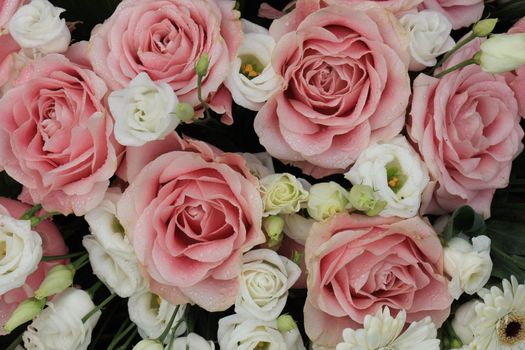 Pink and white  flowers in a floral wedding decoration