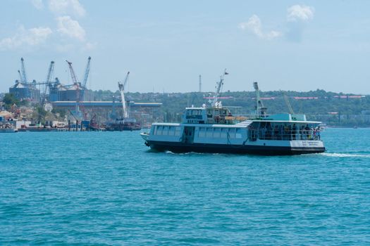 RUSSIA, CRIMEA - JUL 08, 2022: Ship cargo bulbous bow large yupiter view ocean sea water, concept industry vessel for power for port big, shipyard heavy. Export breathtaking fresh,