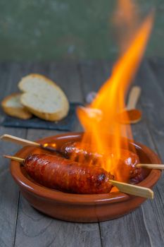 spicy chorizo to hell cooked over a fire right on the table