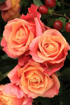 Big pink roses in a floral wedding decoration