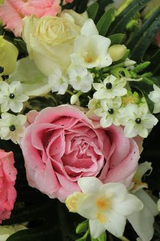 Wedding arrangement in various shades of pink and white