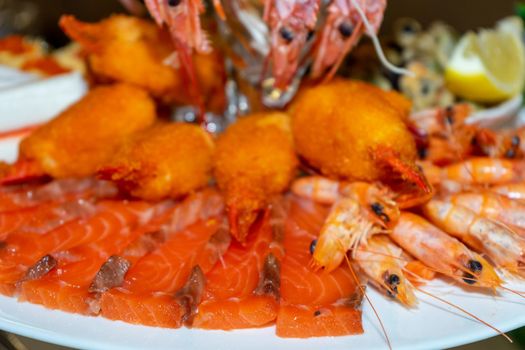 Red fish and boiled crayfish as an appetizer for beer.