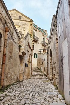 Scenic landscape of the age-old town of Matera - european capital of culture in 2019, Sassi district, southern Italy. Ancient houses of an old stone city, Unesco heritage site.