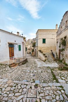 Picturesque view of the age-old town of Matera - european capital of culture in 2019, Sassi district, southern Italy. Ancient houses of an old stone city, Unesco heritage site.