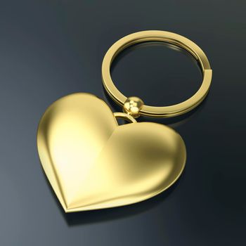 Shiny gold keyring with heart on dark background