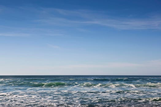 Waves of Atlantic Ocean and blue sky in France