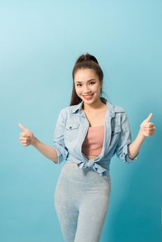 Active young woman in casual summer outfit having fun indoor.