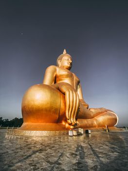 Big Buddha during sunset at Wat Muang in Ang Thong, Thailand, south east asia