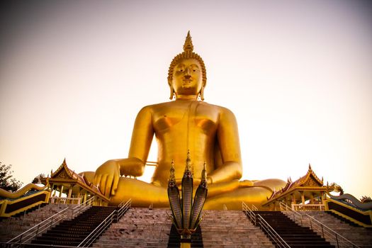 Big Buddha during sunset at Wat Muang in Ang Thong, Thailand, south east asia