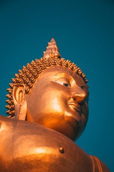 Big Buddha during sunset at Wat Muang in Ang Thong, Thailand, south east asia