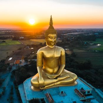 Big Buddha during sunset at Wat Muang in Ang Thong, Thailand, south east asia