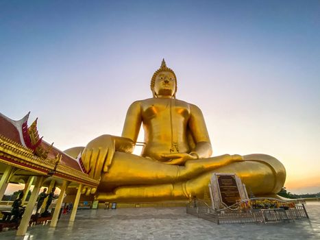 Big Buddha during sunset at Wat Muang in Ang Thong, Thailand, south east asia