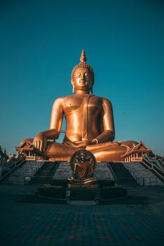 Big Buddha during sunset at Wat Muang in Ang Thong, Thailand, south east asia