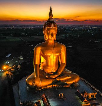 Big Buddha during sunset at Wat Muang in Ang Thong, Thailand, south east asia