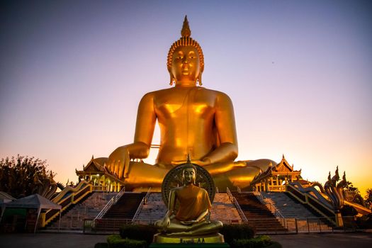 Big Buddha during sunset at Wat Muang in Ang Thong, Thailand, south east asia