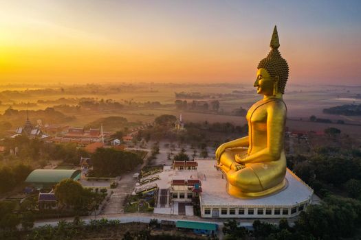 Big Buddha during sunset at Wat Muang in Ang Thong, Thailand, south east asia