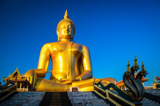 Big Buddha during sunset at Wat Muang in Ang Thong, Thailand, south east asia