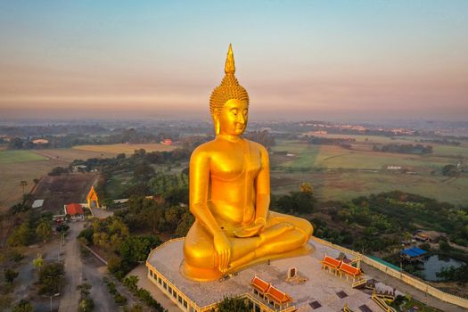 Big Buddha during sunset at Wat Muang in Ang Thong, Thailand, south east asia