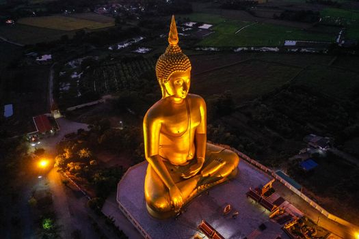 Big Buddha during sunset at Wat Muang in Ang Thong, Thailand, south east asia