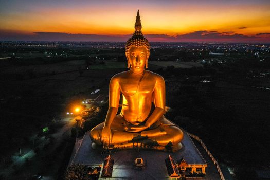 Big Buddha during sunset at Wat Muang in Ang Thong, Thailand, south east asia