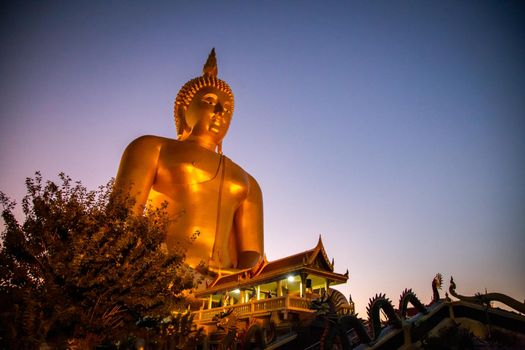 Big Buddha during sunset at Wat Muang in Ang Thong, Thailand, south east asia