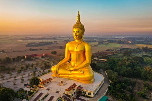 Big Buddha during sunset at Wat Muang in Ang Thong, Thailand, south east asia