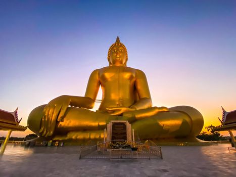 Big Buddha during sunset at Wat Muang in Ang Thong, Thailand, south east asia