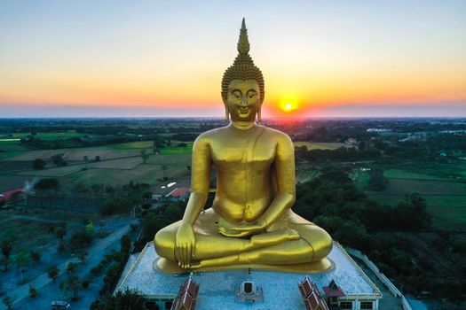 Big Buddha during sunset at Wat Muang in Ang Thong, Thailand, south east asia