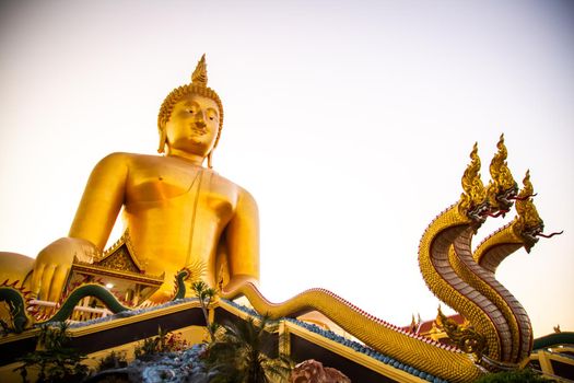 Big Buddha during sunset at Wat Muang in Ang Thong, Thailand, south east asia