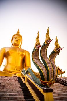 Big Buddha during sunset at Wat Muang in Ang Thong, Thailand, south east asia