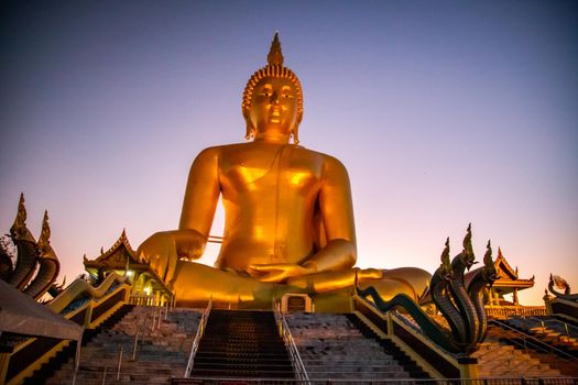 Big Buddha during sunset at Wat Muang in Ang Thong, Thailand, south east asia