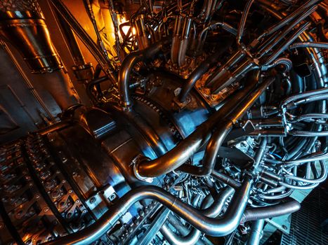 Gas Turbine with steel elements and hoses with blue-orange lighting