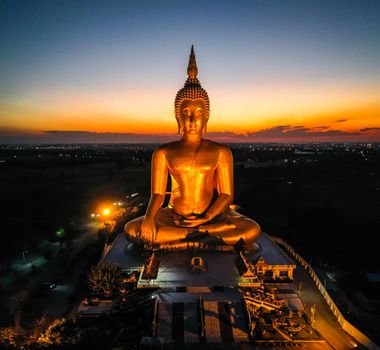 Big Buddha during sunset at Wat Muang in Ang Thong, Thailand, south east asia