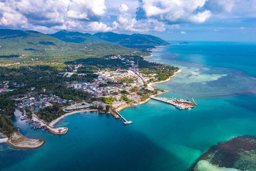 Aerial view of Thong Sala pier, boat and koh Tae Nai in koh Phangan, Thailand, south east asia