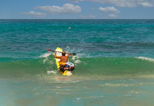 Regular kayaking club training rescuer with equipment must help a friend