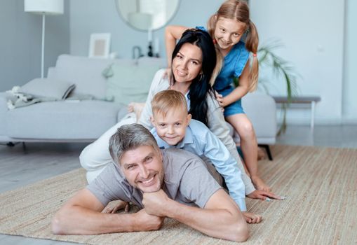 portrait of a happy family with two children . photo with a copy-space.