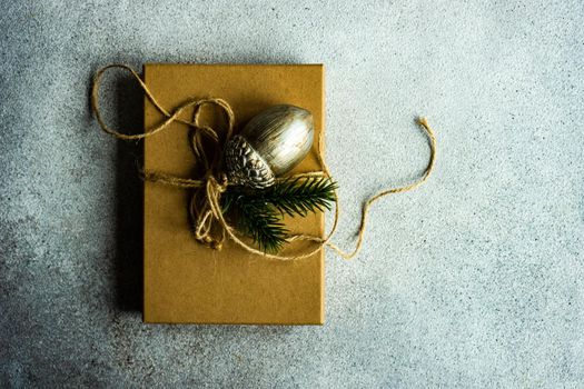 Christmas holiday gift box wrapping concept on concrete background