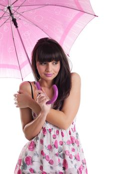 beauty woman freeze under rose umbrella in summer dress isolated