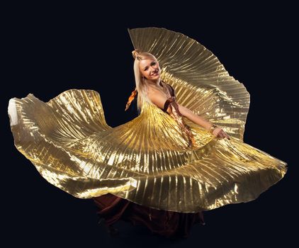 Beauty blond girl dance with flying gold wing - oriental costume